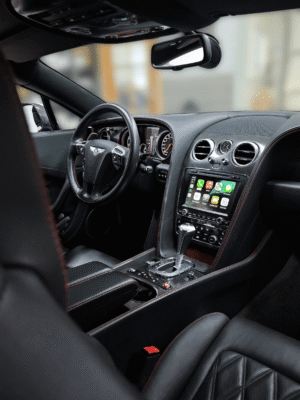Bentley interior photo with Apple Carplay multimedia view.